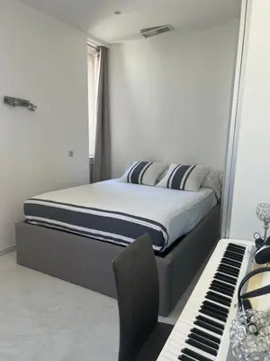Un ou plusieurs lits dans un hébergement de l'établissement Appartement Haut Standing 5 pièces Cannes centre