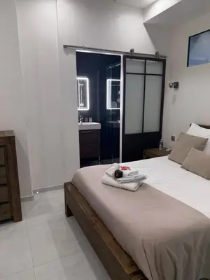 Un ou plusieurs lits dans un hébergement de l'établissement Appartement Haut Standing 5 pièces Cannes centre