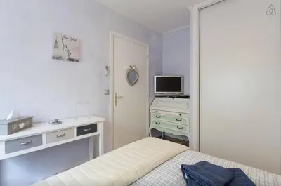 Télévision ou salle de divertissement dans l'établissement Appartement Angela