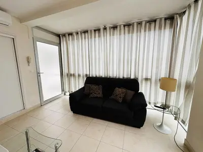 Coin salon dans l'établissement Two bedroom apartment on a high floor in the center of Cannes a few steps from the Croisette beaches - 2229