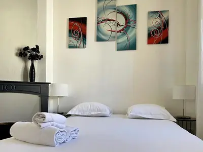 Un ou plusieurs lits dans un hébergement de l'établissement Viva Riviera - 10 Rue Florian