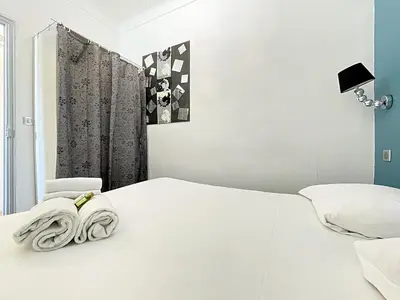 Un ou plusieurs lits dans un hébergement de l'établissement Viva Riviera - 10 Rue Florian