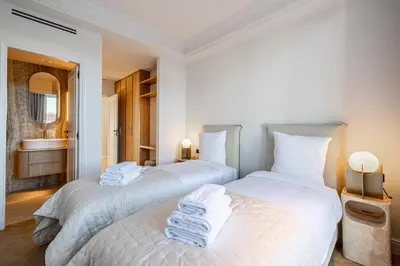 Un ou plusieurs lits dans un hébergement de l'établissement 1974 - Luxurious 3 bedrooms - Sea view & Parking
