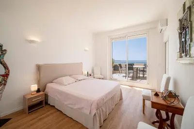 Un ou plusieurs lits dans un hébergement de l'établissement Cannes - Roof terrace for rent