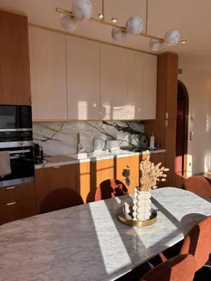 Cuisine ou kitchenette dans l'établissement Superbe appartement Art Déco avec roof top