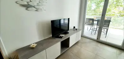 Télévision ou salle de divertissement dans l'établissement O'Cap