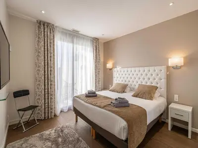 Un ou plusieurs lits dans un hébergement de l'établissement Appt Exclusif - 4BR 8P- Parking - Croisette