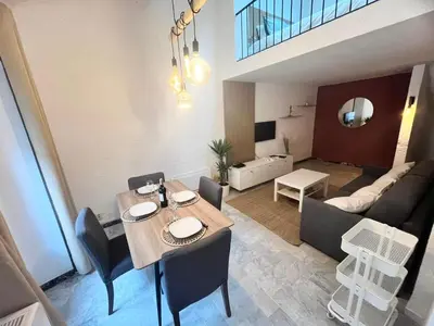 Coin salon dans l'établissement Studio Design et Cosy à 8 min à Pied des Plages