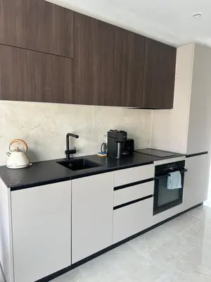 Cuisine ou kitchenette dans l'établissement Suite le Venitia - Appartement standing