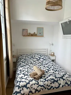 Un ou plusieurs lits dans un hébergement de l'établissement App neuf 1 chambre près du centre et plages