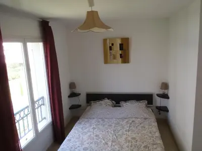 Un ou plusieurs lits dans un hébergement de l'établissement Appartement Les Alizés