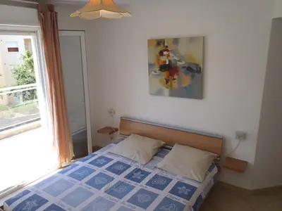 Un ou plusieurs lits dans un hébergement de l'établissement Appartement Les Alizés