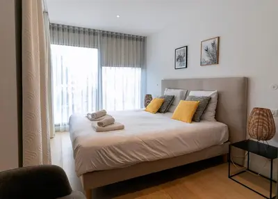 Un ou plusieurs lits dans un hébergement de l'établissement LE STANDING - Appartement de haut standing proche du port