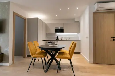 Cuisine ou kitchenette dans l'établissement LE STANDING - Appartement de haut standing proche du port