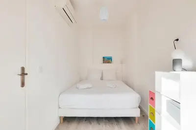 Un ou plusieurs lits dans un hébergement de l'établissement Le Petit Fleury – Balcony, Calm in Cannes
