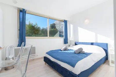 Un ou plusieurs lits dans un hébergement de l'établissement Studio en bord de plage