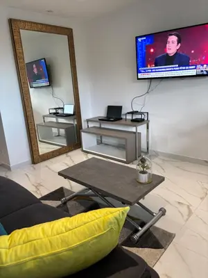 Télévision ou salle de divertissement dans l'établissement Studio Design mer