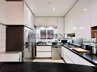 Cuisine ou kitchenette dans l'établissement Grande Villa Cannes Centre havre de paix