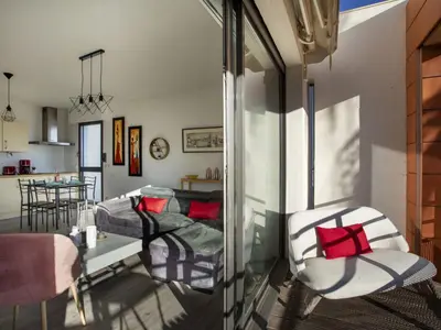 Coin salon dans l'établissement Apartment Le Garden Beach by Interhome