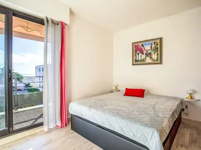 Un ou plusieurs lits dans un hébergement de l'établissement Apartment Le Garden Beach by Interhome