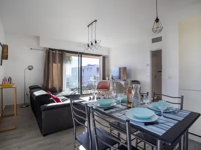 Coin salon dans l'établissement Apartment Le Garden Beach by Interhome