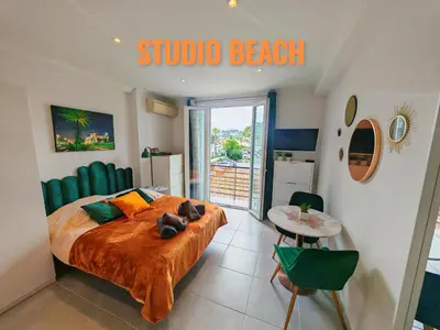 Un ou plusieurs lits dans un hébergement de l'établissement Studio Beach