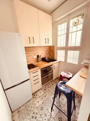 Cuisine ou kitchenette dans l'établissement Le Grand Palais