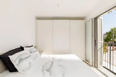 Un ou plusieurs lits dans un hébergement de l'établissement CALYPSO- Superbe perle, Vieil Antibes, wifi, climatisation