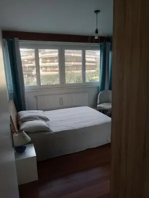 Un ou plusieurs lits dans un hébergement de l'établissement Appartement avec vue mer à Antibes