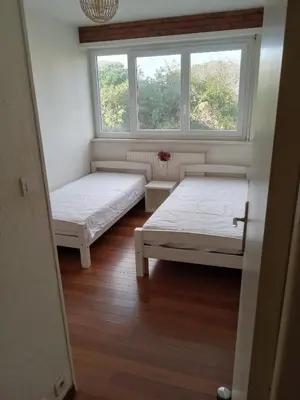 Un ou plusieurs lits dans un hébergement de l'établissement Appartement avec vue mer à Antibes