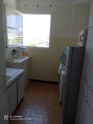 Cuisine ou kitchenette dans l'établissement Bel appartement face mer