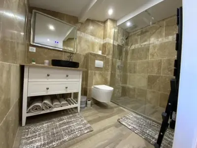 Salle de bains dans l'établissement Villa Lagon