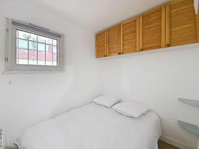 Un ou plusieurs lits dans un hébergement de l'établissement Vacation apartment near sea with private parking