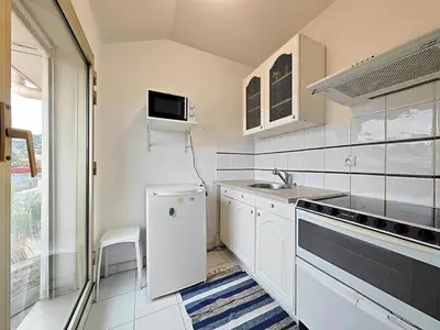 Cuisine ou kitchenette dans l'établissement Studio Etoile d'Or by Viva Riviera