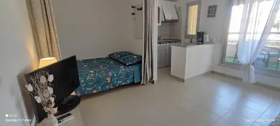 Cuisine ou kitchenette dans l'établissement studio proche gare et ville