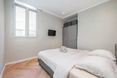 Un ou plusieurs lits dans un hébergement de l'établissement Bel appartement centre Cannes 1min de la Croisette