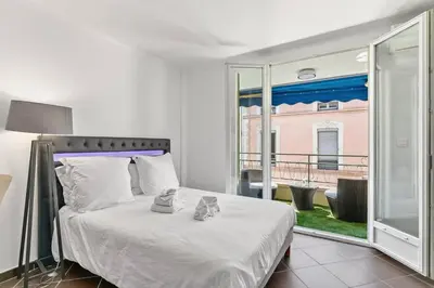 Un ou plusieurs lits dans un hébergement de l'établissement Luxury Studio YourHostHelper