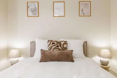 Un ou plusieurs lits dans un hébergement de l'établissement Cannes banana apartment