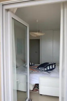 Un ou plusieurs lits dans un hébergement de l'établissement Appartement Alchimy