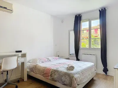Un ou plusieurs lits dans un hébergement de l'établissement Holiday Sun Villa