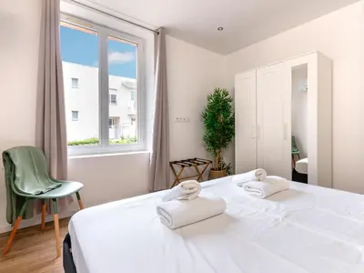 Un ou plusieurs lits dans un hébergement de l'établissement Jolie maison familiale - 2km port et plages - CX