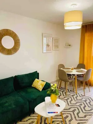 Coin salon dans l'établissement Charming apartment 100m from the beach