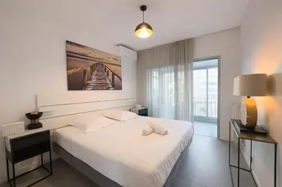 Un ou plusieurs lits dans un hébergement de l'établissement BEAUTIFUL 1 - BR APARTMENT - Next To Rue Antibes
