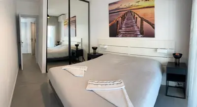 Un ou plusieurs lits dans un hébergement de l'établissement BEAUTIFUL 1 - BR APARTMENT - Next To Rue Antibes