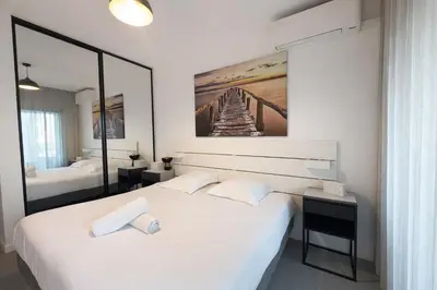 Un ou plusieurs lits dans un hébergement de l'établissement BEAUTIFUL 1 - BR APARTMENT - Next To Rue Antibes