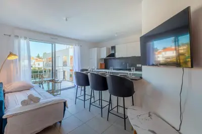 Télévision ou salle de divertissement dans l'établissement Appartement Azzuro - Welkeys