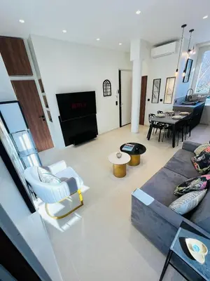 Coin salon dans l'établissement 3 pièces en cœur de cannes
