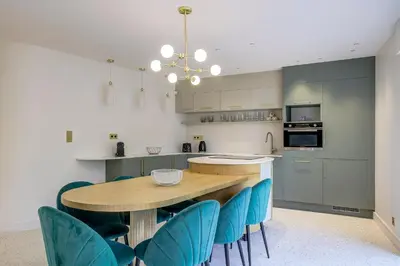 Cuisine ou kitchenette dans l'établissement Perle rare au coeur de la pinede