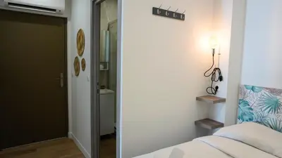 Un ou plusieurs lits dans un hébergement de l'établissement Proche Carlton & Croisette, Appartement 202 - Palmazur Vacances
