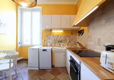 Cuisine ou kitchenette dans l'établissement Viva Riviera 5 Rue Florian